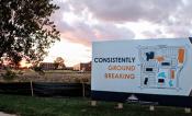 A sign at Research Park that says "Consistently Ground Breaking"